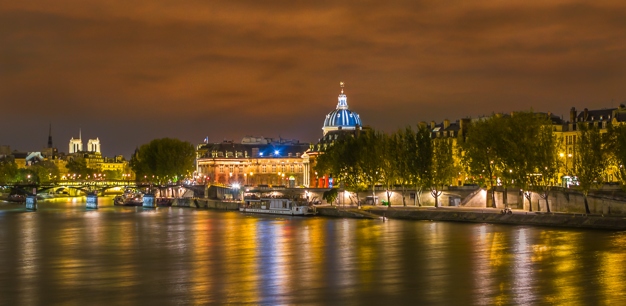 The glowing Seine.
.
Paris, France.
.